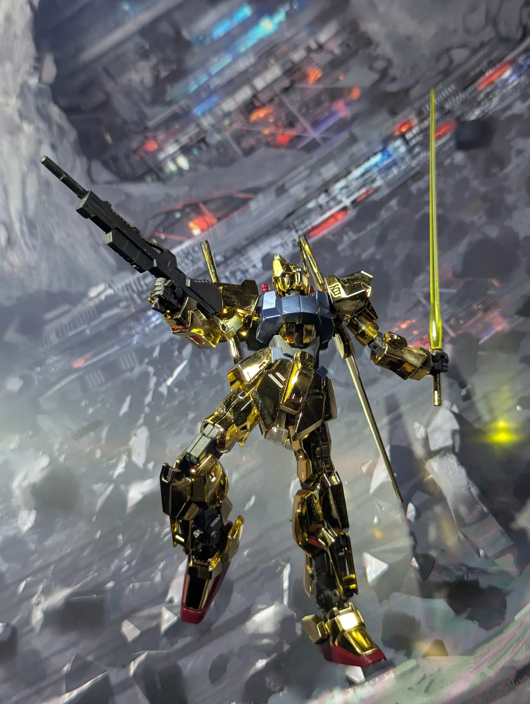 Hyaku Shiki, a gold-plated model with a rifle and beam saber among asteroid rubble